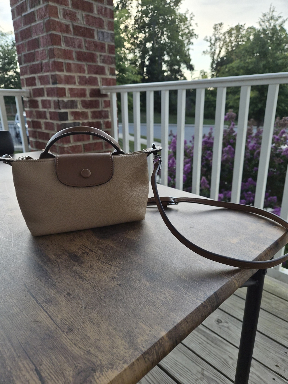 Compact Beige Crossbody Bag with Brown Trim